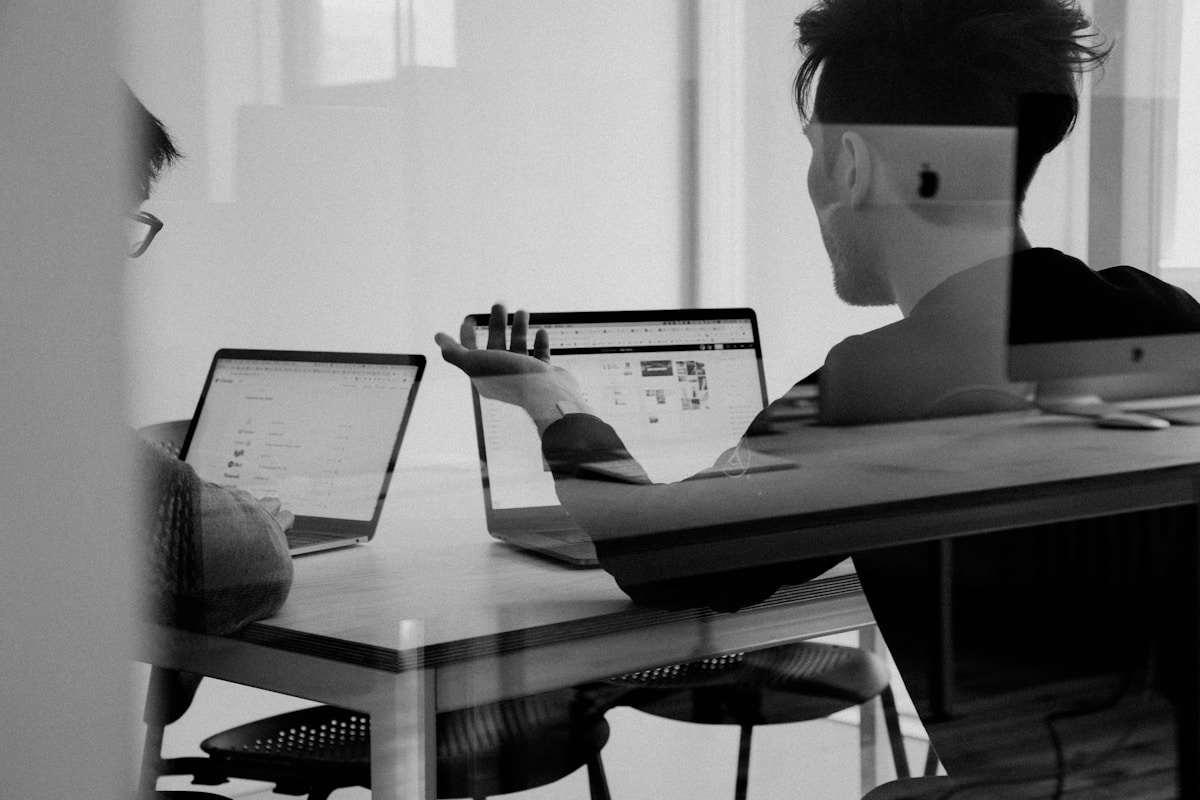 Team analyzing financial survey data on screens